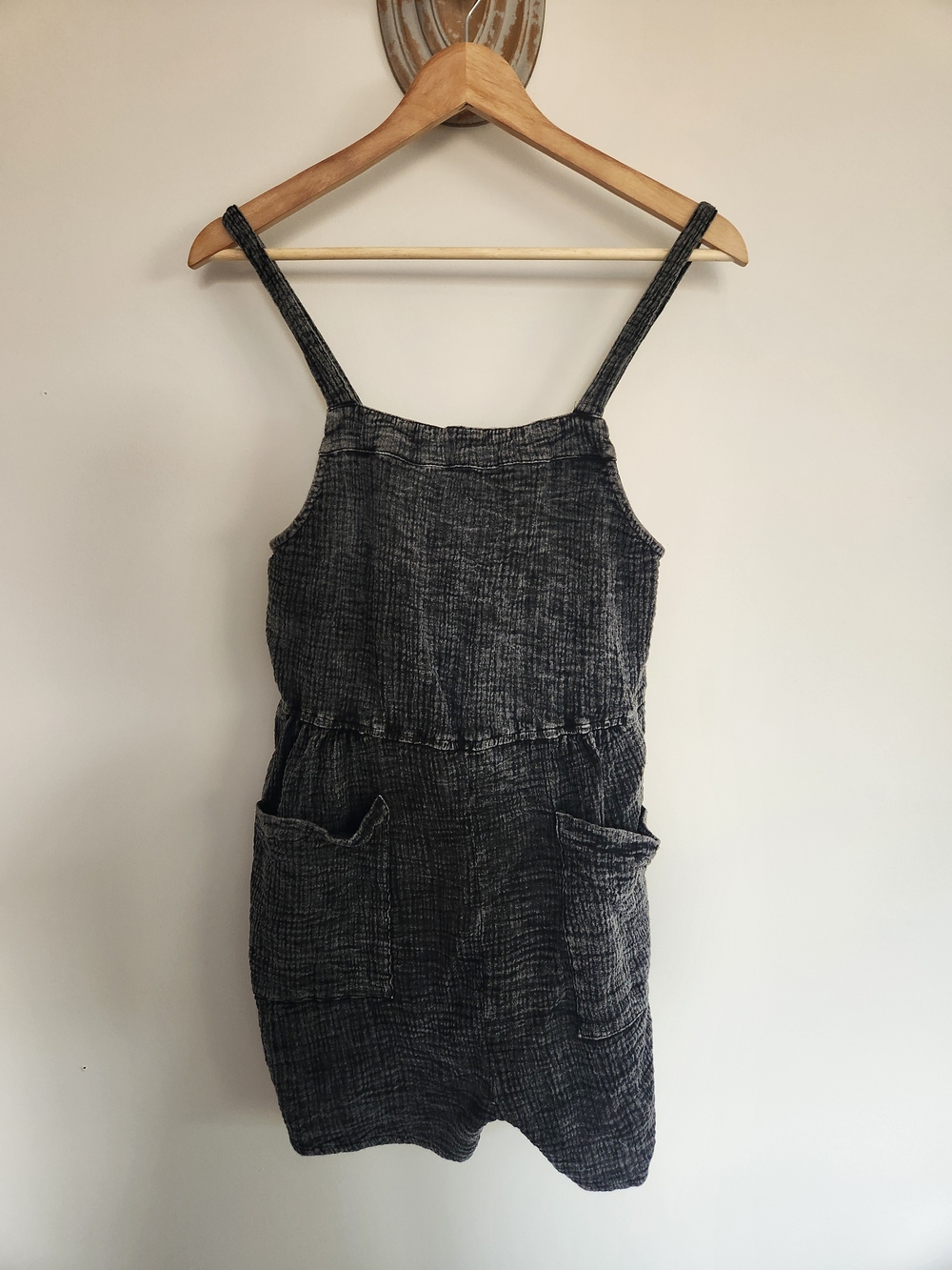 Textured Black Sleeveless Romper with Front Pockets